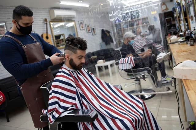 Barbers and hairdressers will be able to resume business in all areas. Photo: Getty Images