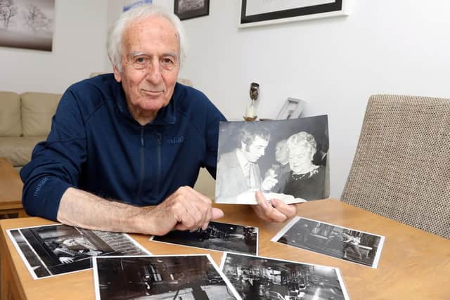 John Allen with photos from his time in TV