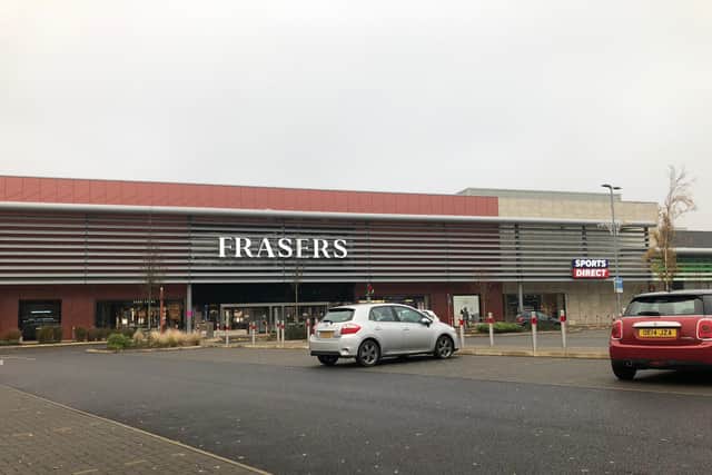 The new signs for Frasers and Sports Direct at Rushden Lakes