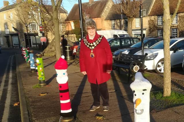 Higham Ferrers mayor Cllr Tina Reavey with some of the town's Christmas decorations