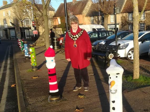 Higham Ferrers mayor Cllr Tina Reavey with some of the town's Christmas decorations