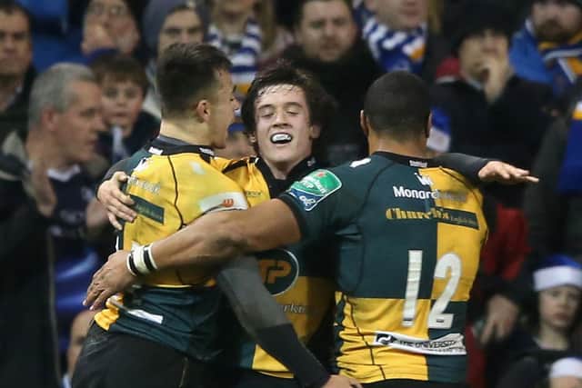 Collins celebrated with Jamie Elliott after Saints won in Dublin in 2013