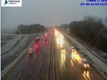 This was the snowy scene across the border on the A14 west of Cambridge this morning
