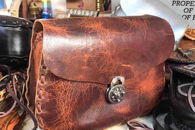 A range of interesting gifts including carved leather are on offer