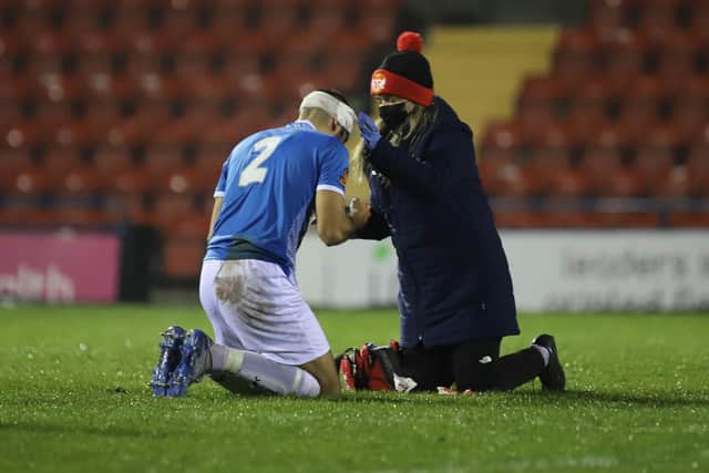 Gary Stohrer is treated for a head injury during the defeat at Bootham Crescent