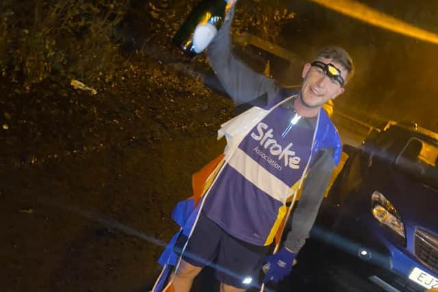 Alfie O'Sullivan on the finish line of his 12th 4-mile run