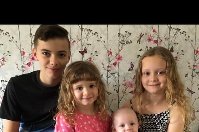 Little Lacie and her brother Riley, and sisters Elisia and Laila