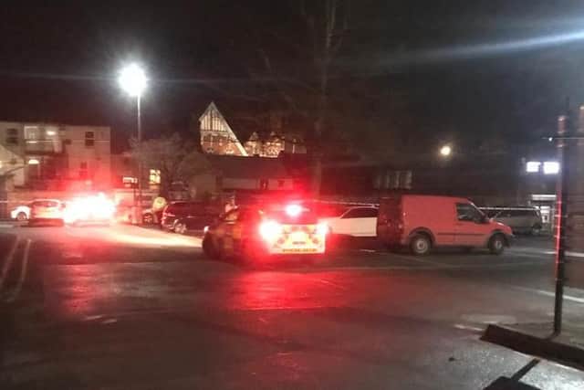 Police at the scene last night.
