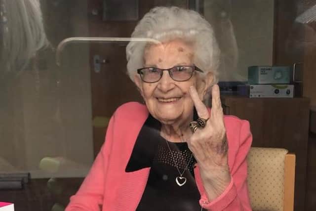 Mary's 'V for victory' over Covid.