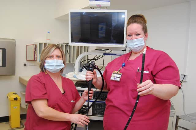 Endoscopy Unit staff members Lucy Drage and Steph Touray with some of the new endoscopy equipment.