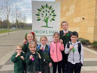Pupils at Priors Hall - A Learning Community with their hi-vis fobs