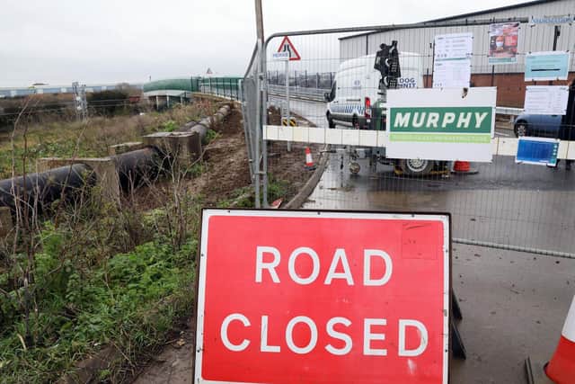 The road remains closed for now.