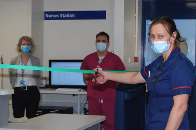 Matron for Urgent Care Wards Louise Hyde, pictured cutting the
ribbon to re-open the MAU.