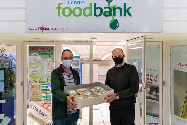 Paul Foster, Community Worker at Weston Favell Centre Foodbank receiving Food4Heroes meals from John Brownhill, Co-Founder of Food4Heroes
