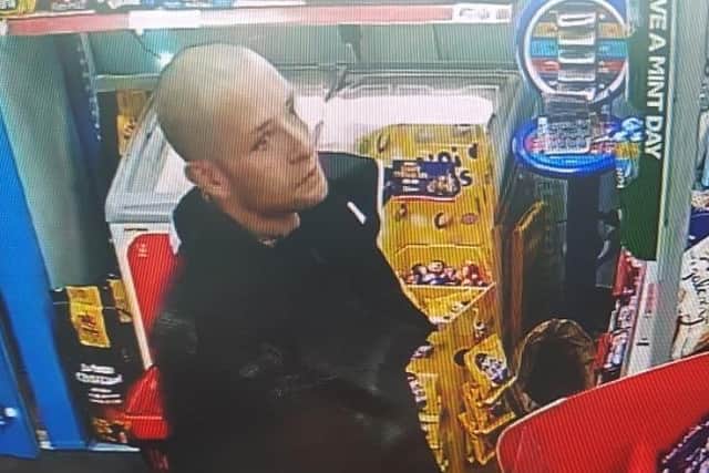 Police are asking for the public's help in identifying this man they would like to speak to in connection with the robbery.