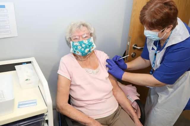Rachel Cheesman gets her jab from Mandy Healy