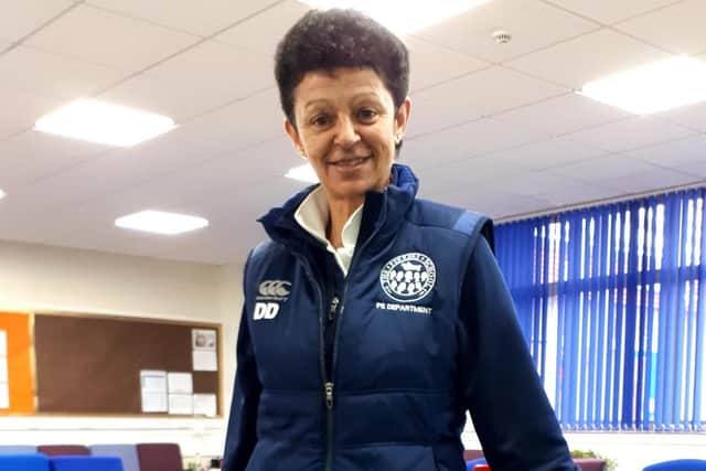 PE Teacher Di Dean