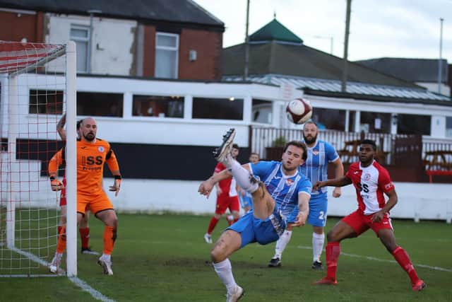 Action from Kettering's FA Trophy win at Ashton United