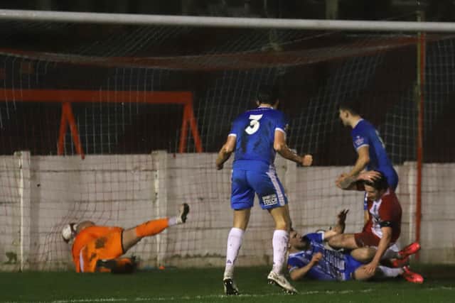 Connor Kennedy's overhead kick sealed the Poppies' 2-1 success at Ashton United in the FA Trophy last weekend