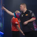 Ricky Evans in action during his 3-1 win over Mickey Mansell in the second round of the World Darts Championship. Pictures courtesy of Lawrence Lustig/PDC