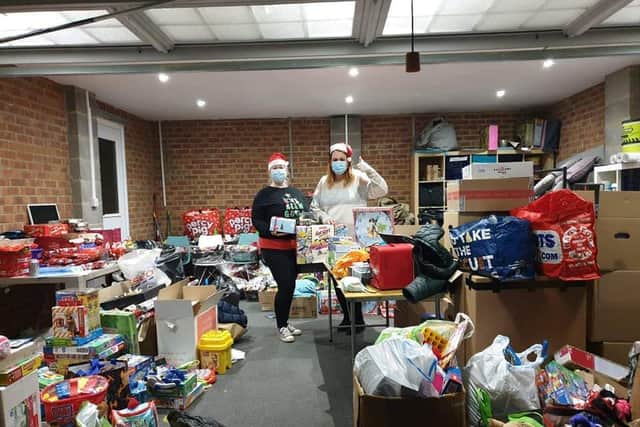 Jo (left) and Emma (right) with the presents.