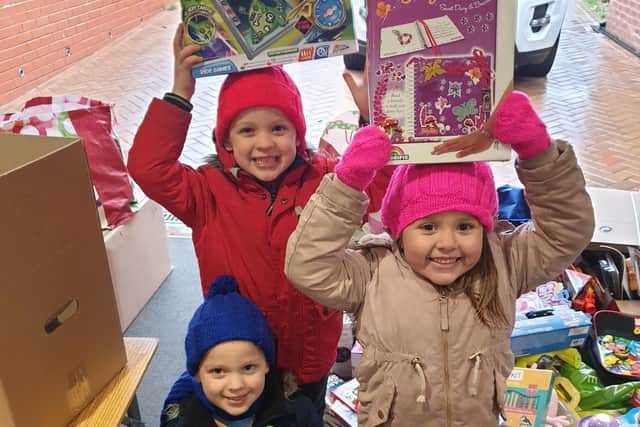 These kind-hearted children visited to drop off some presents.