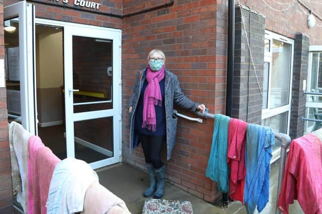Brigstock Parish Council chairman Sally Wilks outside Harpers Court today (Thursday)