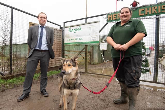 Simon Tyler, sales director for Davidsons Homes South Midlands with Carla Alderman from NANNA Animal Rescue