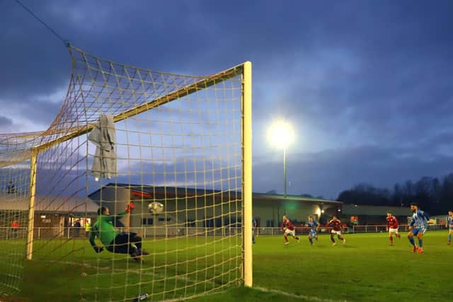 Callum Powell converts the penalty he won to give the Poppies the lead