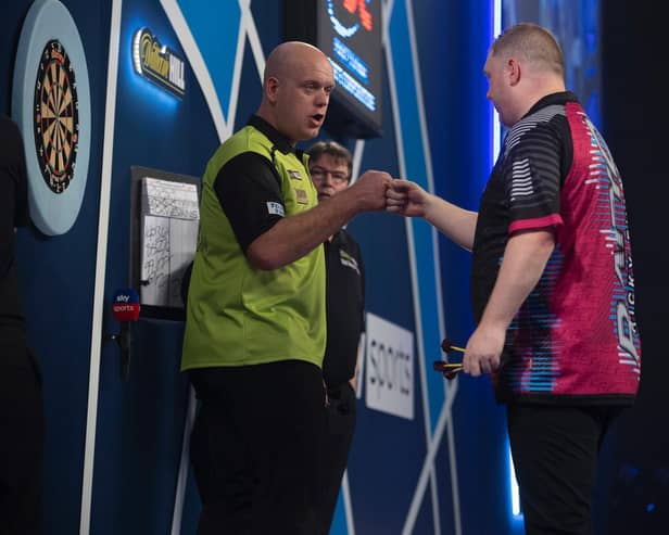 Ricky Evans was beaten by Michael van Gerwen in the World Darts Championship, despite an impressive display. Picture courtesy of Lawrence Lustig/PDC