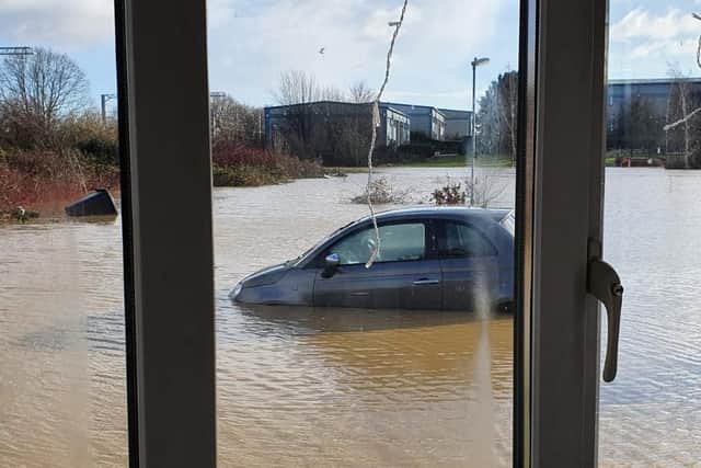 The view from one resident's front window of the flooding