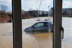 The view from one resident's front window of the flooding