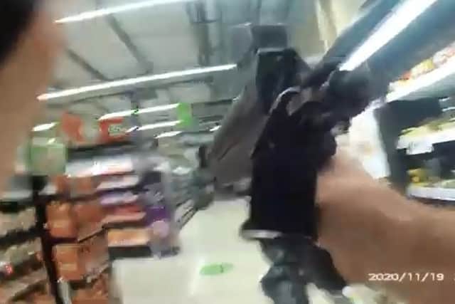 The bodycam footage showed the officers reassure the staff and then enter the supermarket