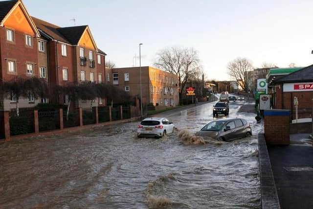 Roads in Northampton were badly affected  by flooding two days before Christmas