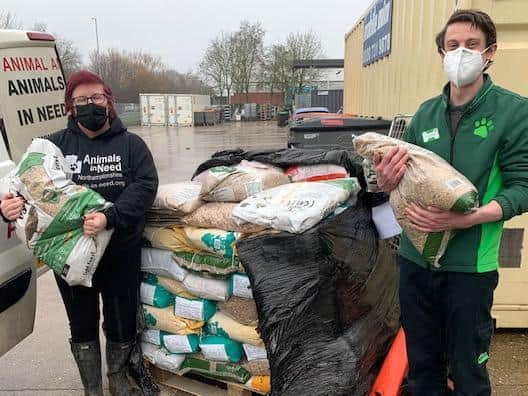 Annie Marriott from Animals In Need with Kelvin from the Corby store