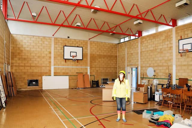 Lesley Thurland in the space that will be the community centre