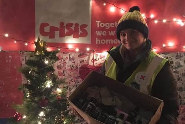A representative from Crisis with the items donated by Lush Northampton