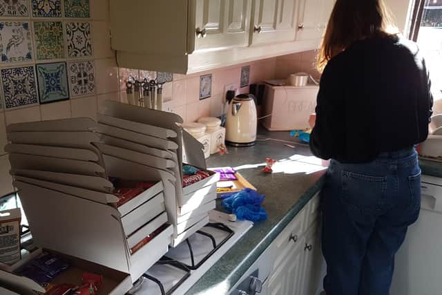 Mae getting the care share boxes ready to deliver