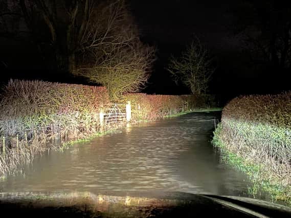 Police reported numerous rural roads flooded following Wednesday night's torrential rain