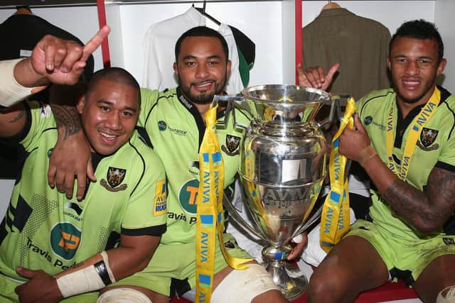 Samu Manoa (centre) with Salesi Ma'afu and Courtney Lawes after Saints claimed Premiership glory in May 2014