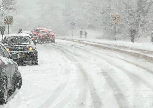 Motorists on Rockingham Hill gave up as the snow became heavier this lunchtime