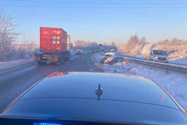 A car skidded into the central reservation barrier on the A14