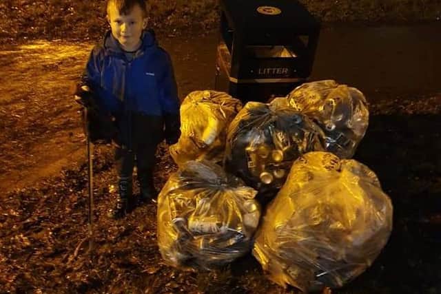 Oscar with some of the litter he helped collect.