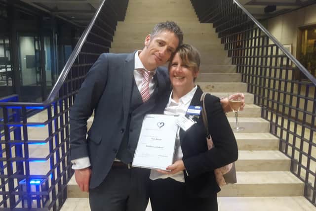 Brendon with Natasha Beames - charity founder Mikayla's mum - with their Lloyd's of London Charity Award won before Christmas.