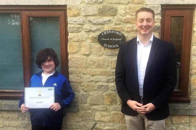 Seth with his certificate and Mark Turner.