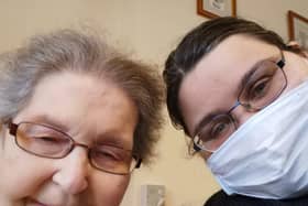 Activities coordinator, Sam Rix (right) pictured with a Boughton Lodge care home resident (left).