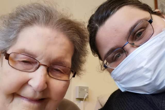Activities coordinator, Sam Rix (right) pictured with a Boughton Lodge care home resident (left).