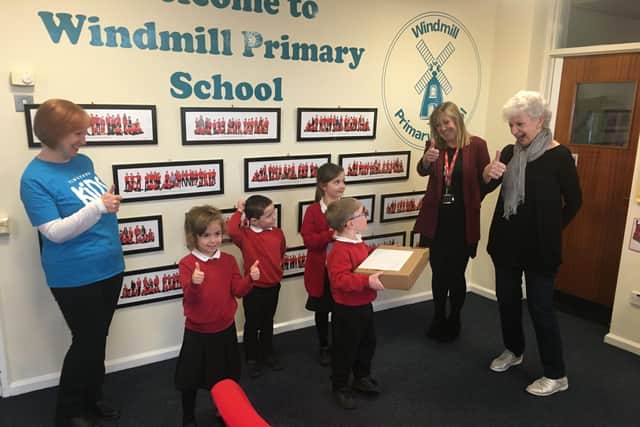 Suzanne Edwards, principal at Windmill School (back right), with Windmill pupils alongside Sandra Willetts and Liz Harris from Central Vineyard Church Raunds