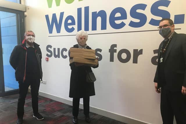 Chris Bateman, assistant principal at Manor School Sports College (right), with Sandra Willetts and Dick Casey from Central Vineyard Church in Raunds