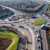 This image shows the road widening that has taken place on the A45 approach to the roundabout, bottom of the image, with the kerbs and footpath in position